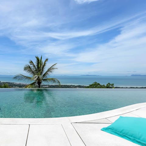 Soak up idyllic views and tropical sunshine from the pool