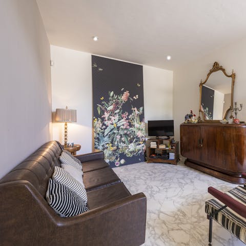 Pour a glass of Chianti and flop down on the leather sofa for a relaxed night in