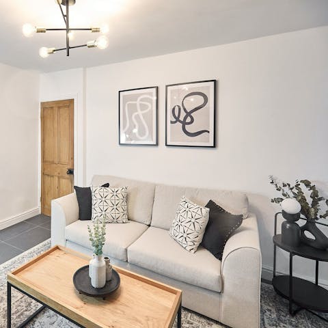 Relax on the sofa after strolling around the village green