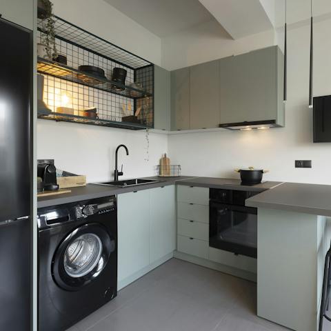 Enjoy extended stays with the well-equipped kitchen
