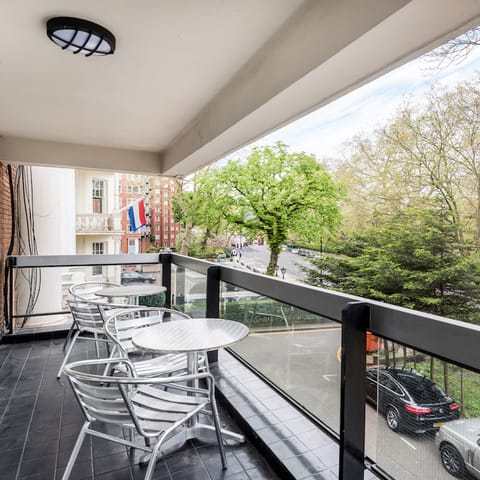 Take a seat on your private balcony and gaze across Hyde Park with your morning coffee