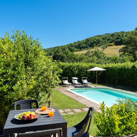Spend slow days by the private pool, surrounded by greenery