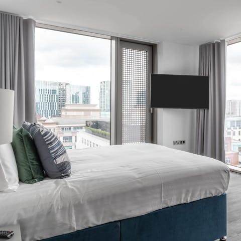 Soak up views of the city as you drift off in the hotel-quality bed