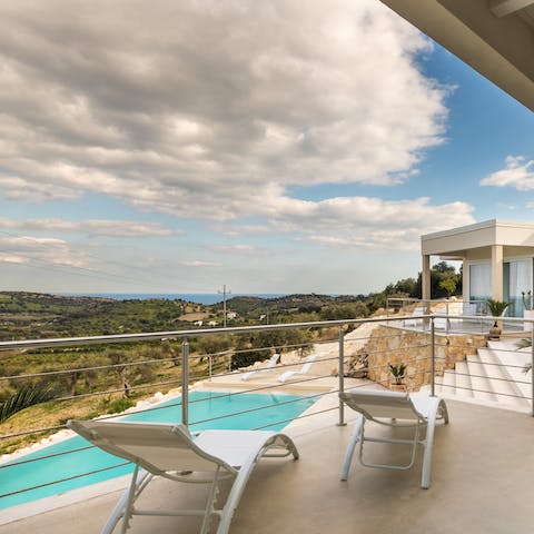 Soak up the sun from your terrace, catching up on your current read with a cocktail in hand