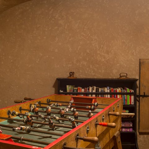 Play a round of table football