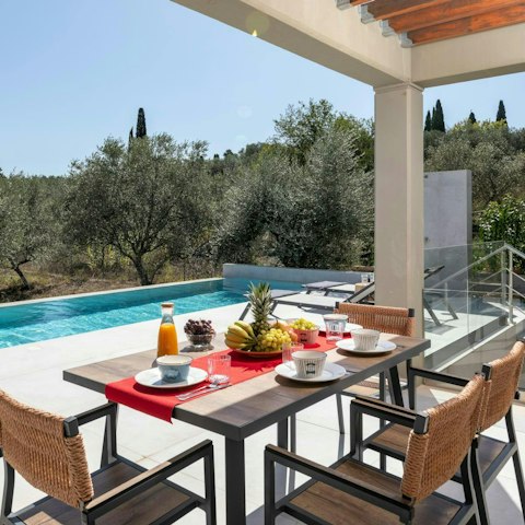 Set the dining table ready for lunch in the glorious sunshine