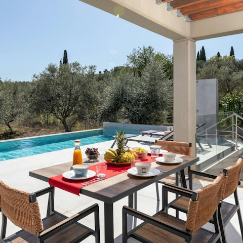 Set the dining table ready for lunch in the glorious sunshine