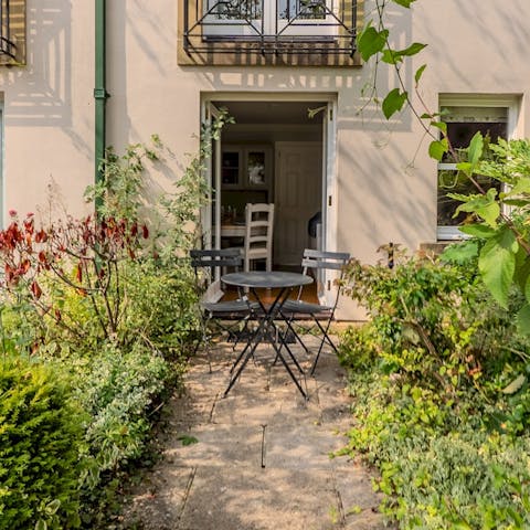 Savour breakfast croissants and hot coffee at the outdoor table
