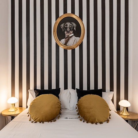 Get some rest in the stylish bedrooms after a busy day in Madrid