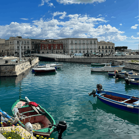 Stroll around the marina, located steps from the door