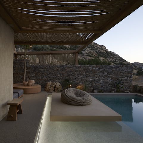 Spend tranquil evenings sipping cocktails by the pool