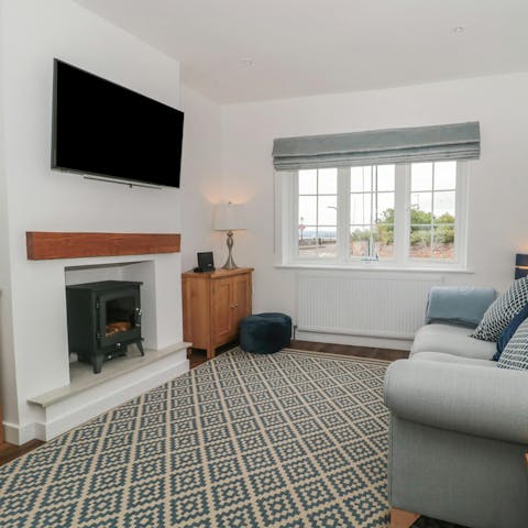 Warm your feet in front of the electric fire