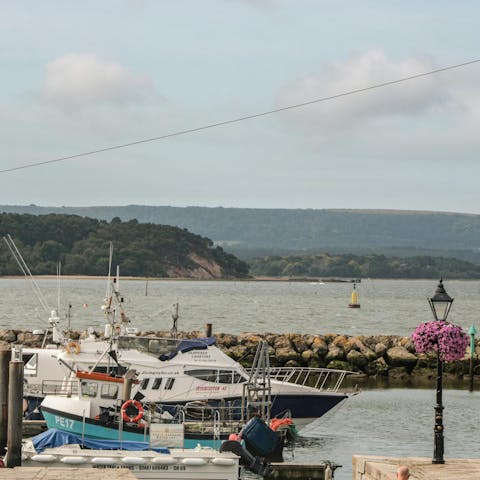 Watch the boats in Poole Quay, moments away