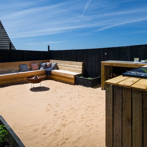 Fire up the barbecue and tuck into dinner on your very own private beach, followed by firepit sessions under the stars