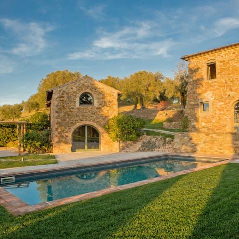 Take a dip in the private pool under the sun set
