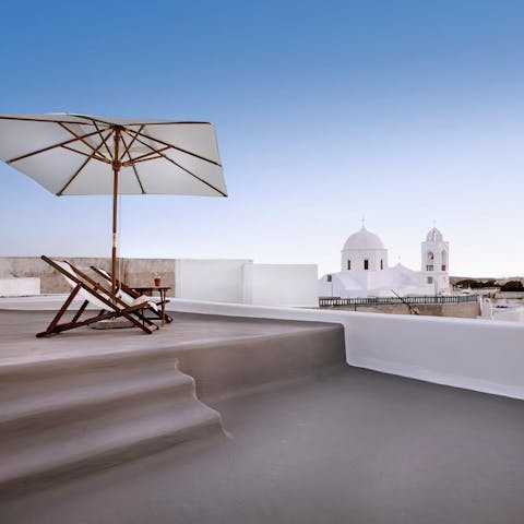 Admire the beautiful views over the town from your raised terrace area