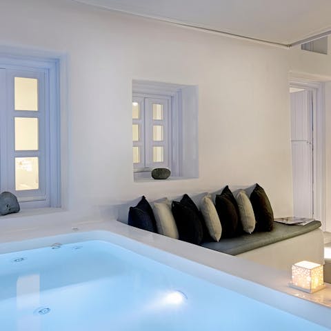 Soak in the hot tub or relax on the outdoor sofa on serene summer evenings