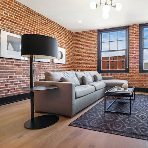 Relax in the stylish red brick interiors