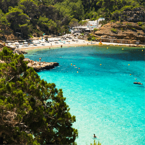 Explore Ibiza's stunning beaches, a fifteen-minute drive away