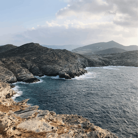 Plan a road trip to explore the rugged coastline of Paros