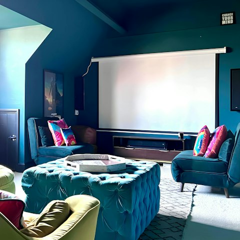 Enjoy family film nights in the home cinema room