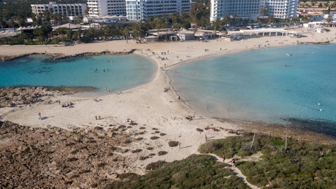 Swim at Nissi Beach, Ayia Napa's most iconic golden stretch