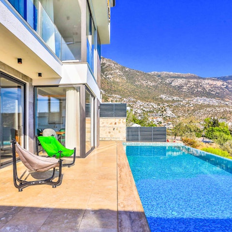 Spend well-deserved lazy days relaxing by the pool