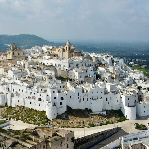 Visit the hilltop town of Ostuni – a thirteen-minute drive away