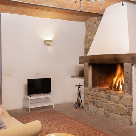 Gather by the log-burning fireplace to warm up in the evening