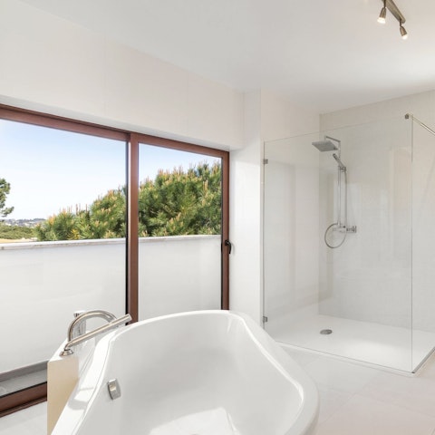 End the evening with a long soak in the en-suite bath
