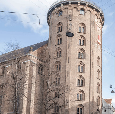 Stay in a historic building right next to the famous Round Tower