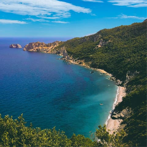 Catch the ferry over to the breathtaking island of Skiathos, a little over an hour away