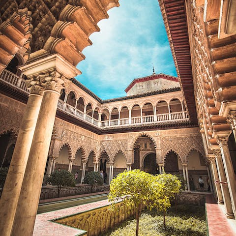 Admire the Real Alcázar de Sevilla, 850 metres away