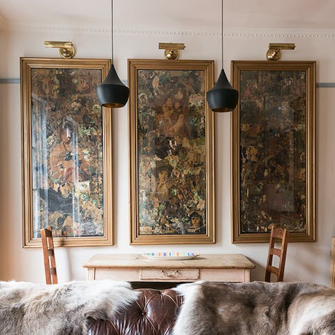 Dining Under The Tom Dixon Lamps