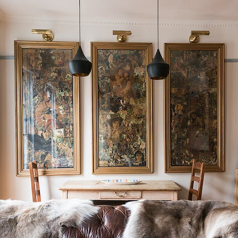 Dining Under The Tom Dixon Lamps