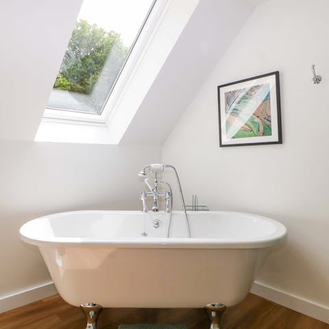 Treat tired feet to a soak in the roll top bath