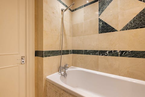 Run yourself a hot bath to relax and unwind after a busy day in the city