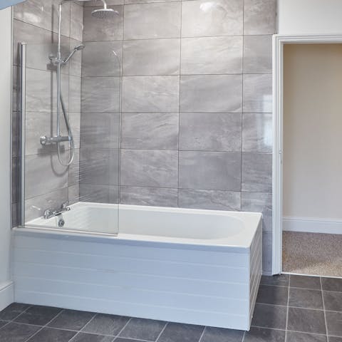 Sneak away for a long bubbly soak after a day at the beach