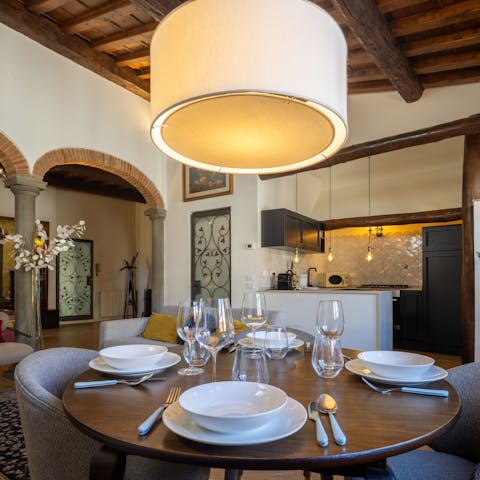 Dine at the stylish table, with seating for four