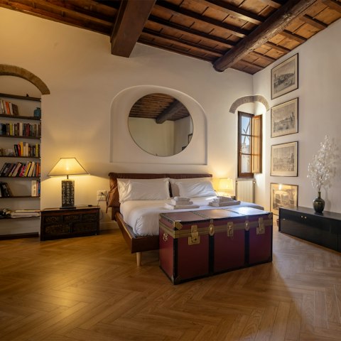 Unwind in the spacious bedroom area after exploring the city