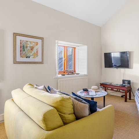 Kick back and relax with a cuppa in the cosy living space