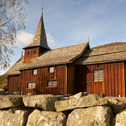 See traditional Norwegian architecture like Hol Old Church, a forty-minute drive away