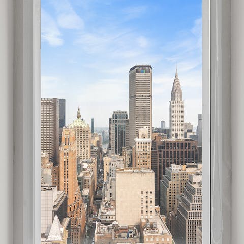 Enjoy the sweeping city views from almost every room at this apartment