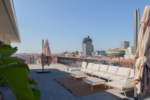 Stretch out in the sun above the Porto skyline
