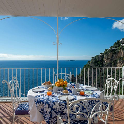Gather on the terrace for breakfast with a sea view