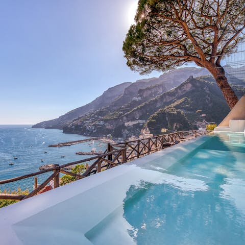 Admire the vistas over the Mediterranean Sea from the private pool