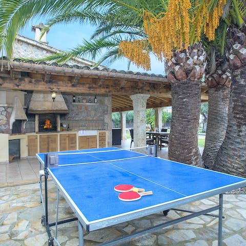 Challenge your friends to a round of table tennis