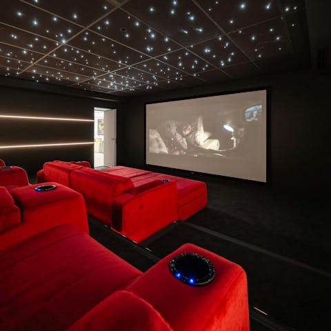 Watch a movie in the private home cinema