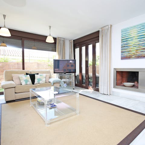 Gather in your bright, welcoming living room for a movie night with loved ones