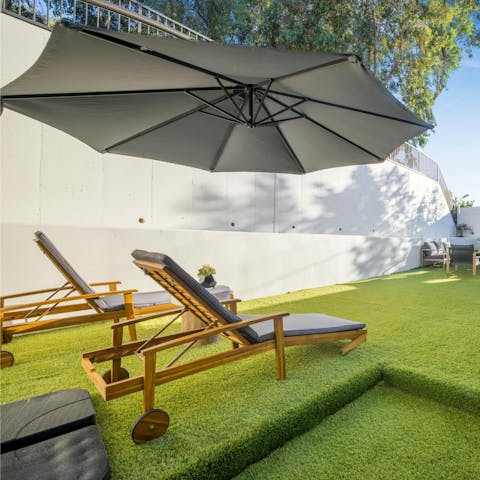 Soak up the Californian sun in the private backyard